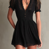 Sigrun — Black Smocked Mini Dress with Sheer Sleeves and Lace-Trim Hem