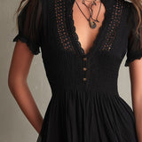 Sigrun — Black Smocked Mini Dress with Sheer Sleeves and Lace-Trim Hem