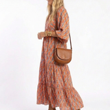 Herta — Orange Ikat-Print Tiered Maxi Dress with Tie Neck and Balloon Sleeves
