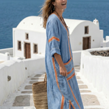 Meliana — Blue Kaftan Midi Dress with V-Neck and Orange Trim