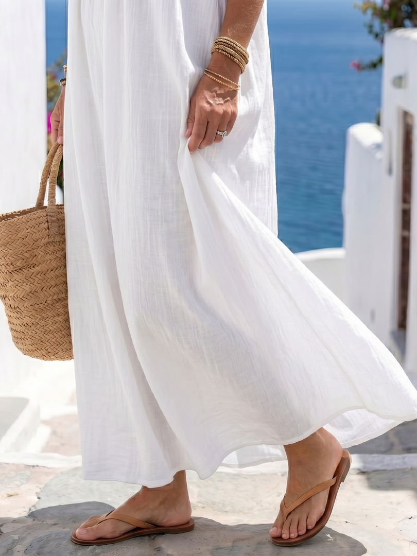 Idonea — Flowing Sleeveless Maxi Dress with Low Back and Thin Straps
