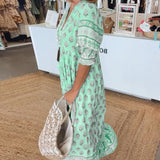 Wilmette — Printed V-Neck Maxi Dress with Tassel Tie and Fringe Hem