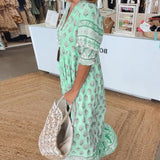 Wilmette — Printed V-Neck Maxi Dress with Tassel Tie and Fringe Hem