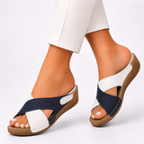 Consuela — Cross-Strap Cushioned Wedge Slides