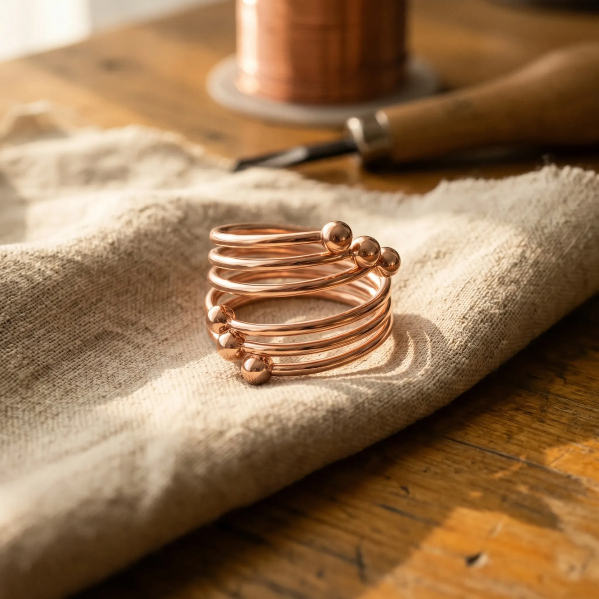 Kinsley — Multi-Coil Spiral Copper-Tone Ring