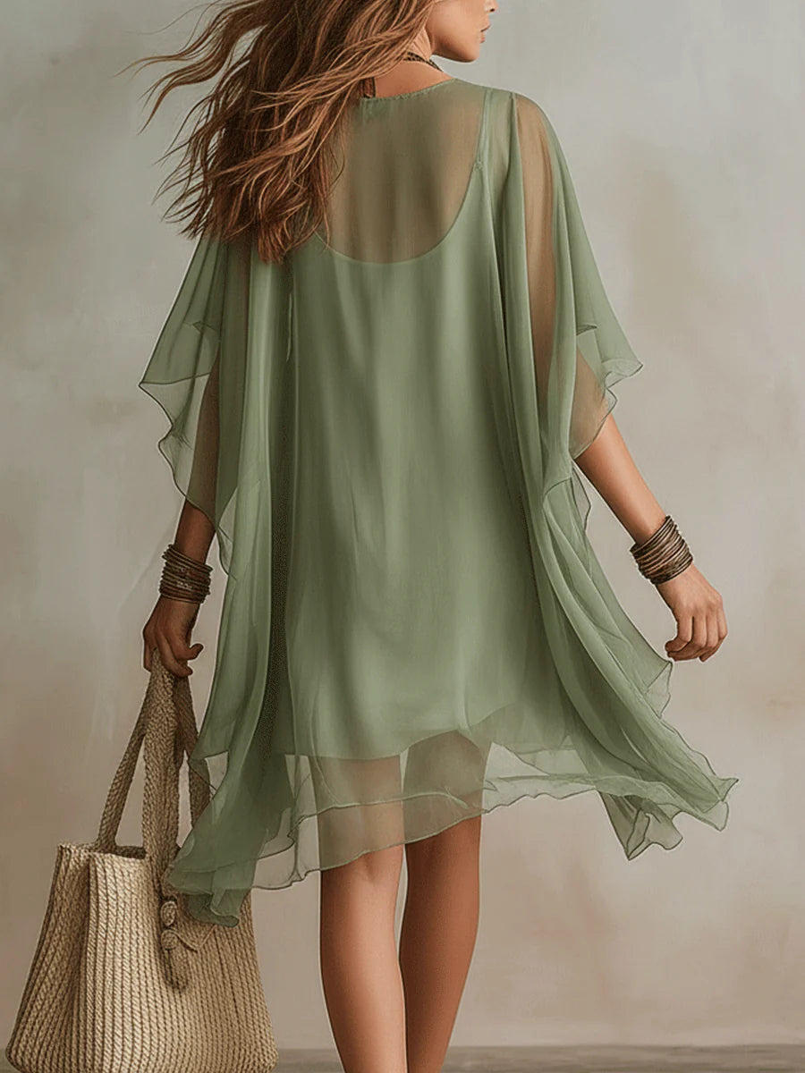 Colleen — Sheer Layered Mini Dress with Flutter Sleeves and Handkerchief Hem
