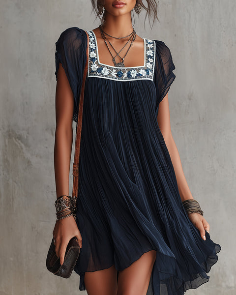 Hanneke — Navy Pleated Mini Dress with Embroidered Square Neckline