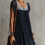 Hanneke — Navy Pleated Mini Dress with Embroidered Square Neckline