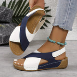 Consuela — Cross-Strap Cushioned Wedge Slides