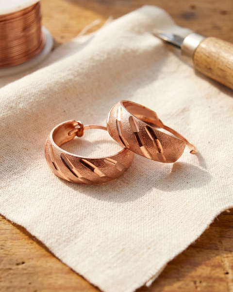 Oaklee — Twist Huggie Copper-Tone Earrings