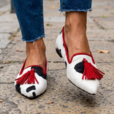 Ivana — Cow-Print Pointed Moccasins with Red Tassels