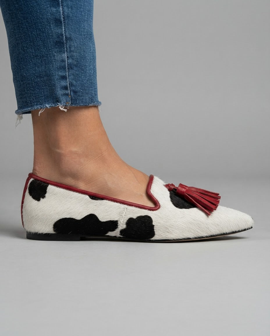 Ivana — Cow-Print Pointed Moccasins with Red Tassels