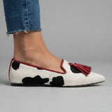 Ivana — Cow-Print Pointed Moccasins with Red Tassels