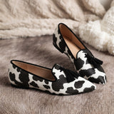 Isotta — Cow-Print Pointed Moccasins with Black Tassels