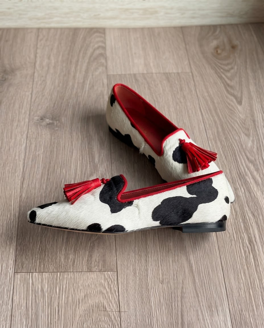 Ivana — Cow-Print Pointed Moccasins with Red Tassels