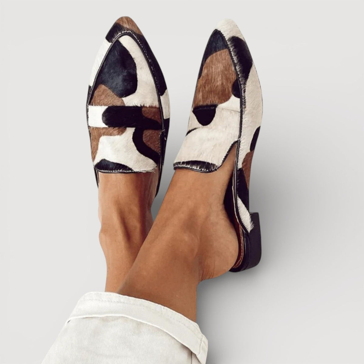 Erica — Cow-Print Pointed Moccasins
