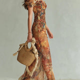 Elfriede — Orange Floral Maxi Dress with Ruffle Sleeves and Front Slit